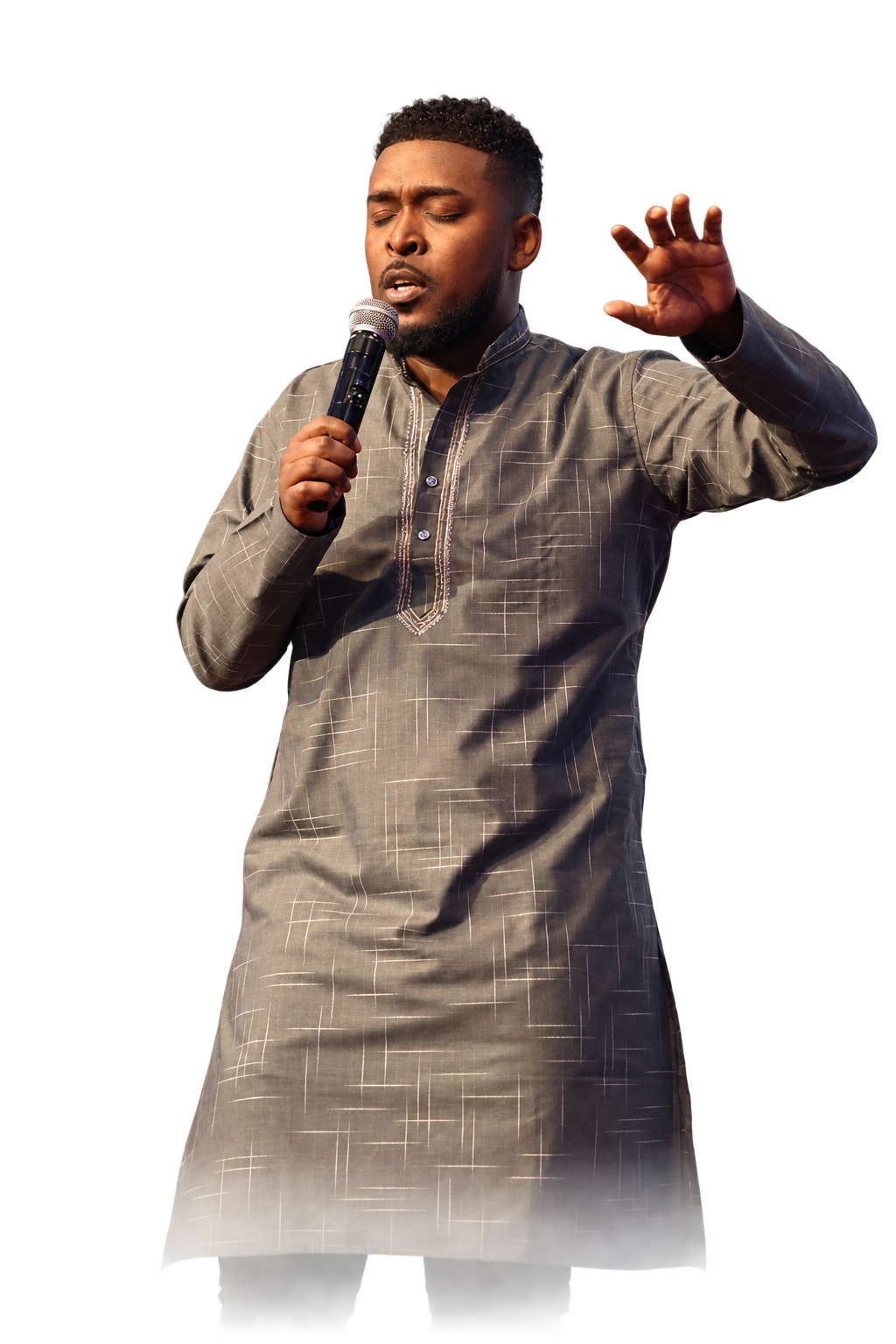 Prophet Mike Sebareme ministering with a microphone and an outstretched hand